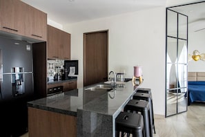 Appartement Deluxe | Cuisine privée | Bouilloire électrique