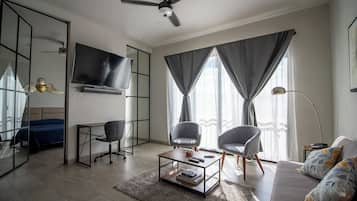 Deluxe appartement | Woonruimte | Televisie
