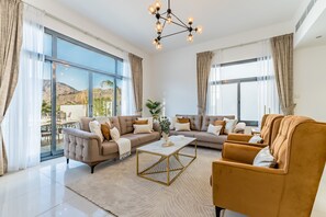 TV - Modern 3BR w/ Mountain Views & Private Pool in Al Dana , Sharm by Deluxe Holiday Homes (Fujairah)