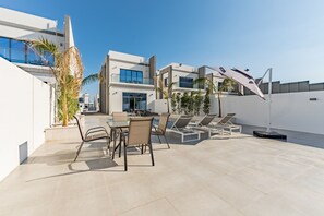 Outdoor dining - Modern 3BR w/ Mountain Views & Private Pool in Al Dana , Sharm by Deluxe Holiday Homes (Fujairah)