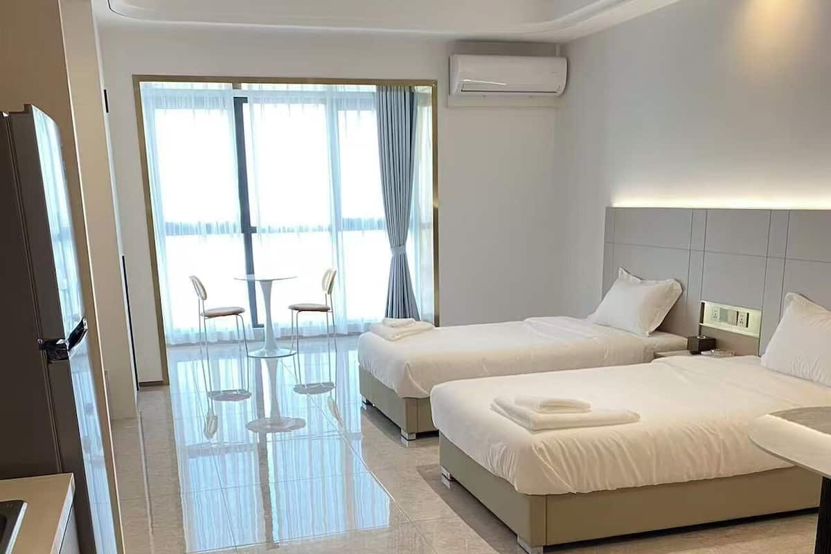 Twin Room, River View | Desk, free WiFi, bed sheets