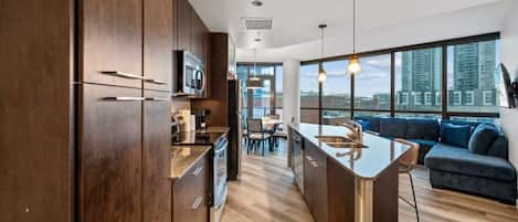 Coffee/tea maker, fridge, microwave, oven