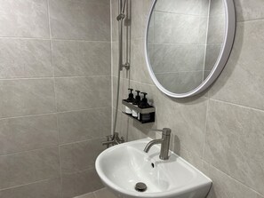 Basic Double Room, 1 Queen Bed, Non Smoking, Private Bathroom | Bathroom | Shower, hair dryer, slippers, towels - StayDucksan Hotel (Suwon)