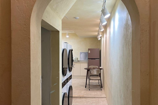 Mini-fridge, microwave, stovetop, coffee/tea maker