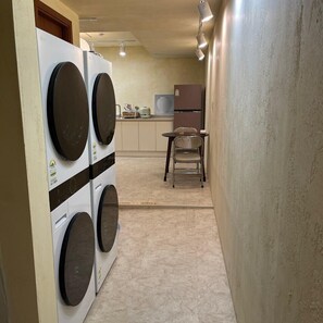 Mini-fridge, microwave, stovetop, coffee/tea maker