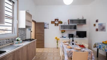 Villa, Patio, Garden View | Private kitchen | Fridge, microwave, stovetop, cookware/dishes/utensils