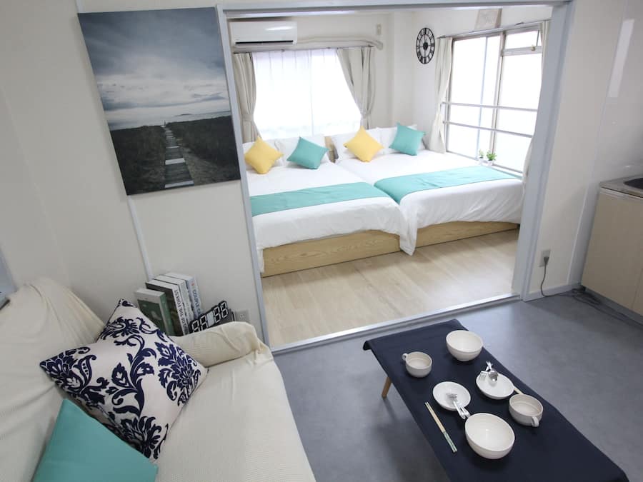 Kamar Triple Bisnis, Beberapa Tempat Tidur, Bebas Asap Rokok (201) | Area keluarga