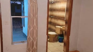 Shower, towels, soap, toilet paper