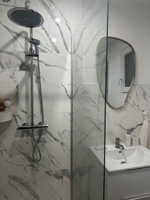 Hair dryer, towels, toilet paper