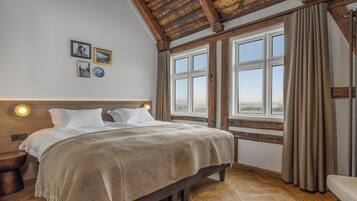 Habitación doble de lujo, vista al océano | Ropa de cama de alta calidad y artículos del minibar gratis