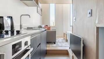 Apartment | Private kitchen | Fridge, microwave, oven, stovetop