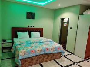 Economy Room, Balcony, City View | Desk, laptop workspace, blackout curtains, soundproofing