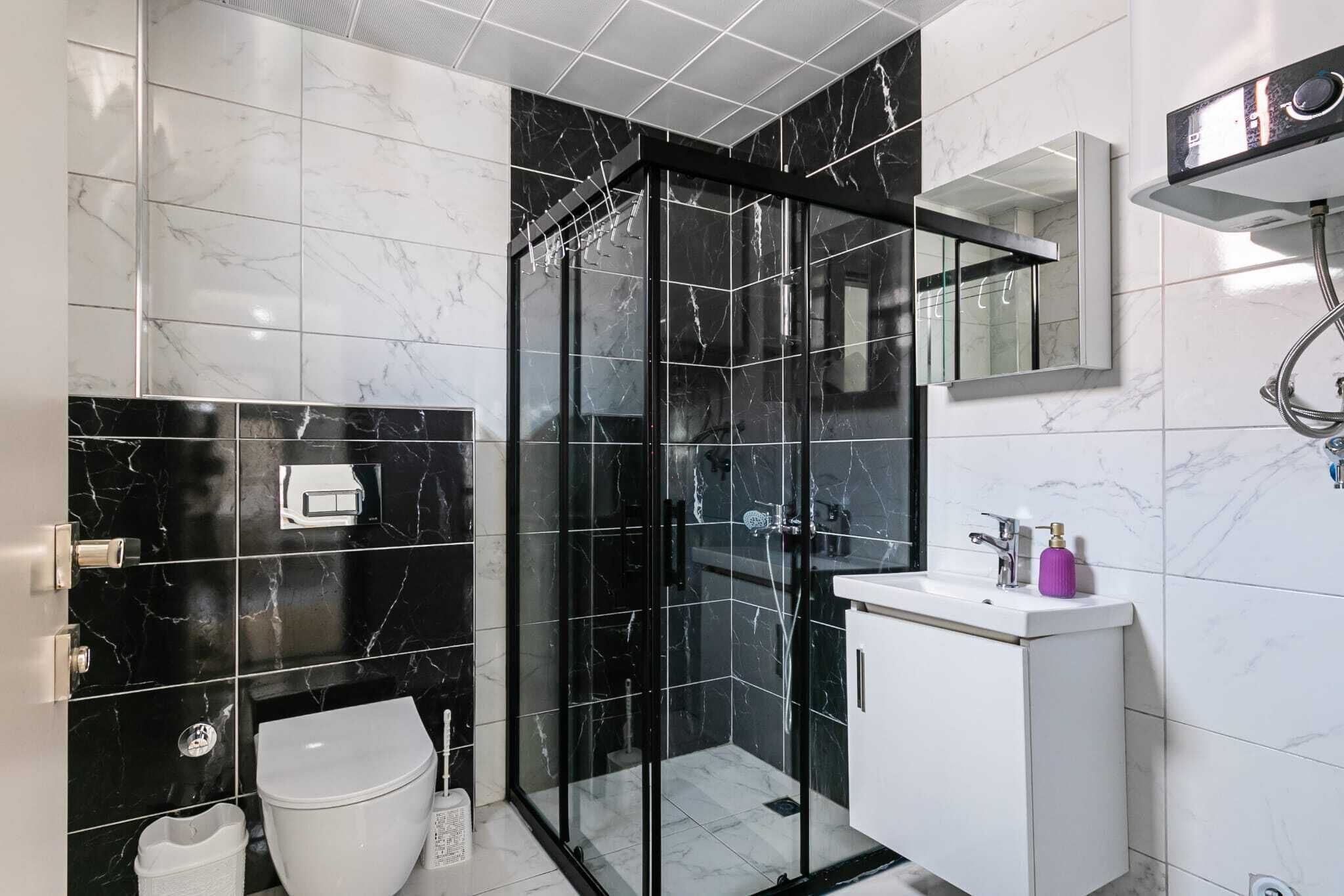 Comfort Suite, Balcony, Garden View | Bathroom | Shower, hair dryer, towels, soap