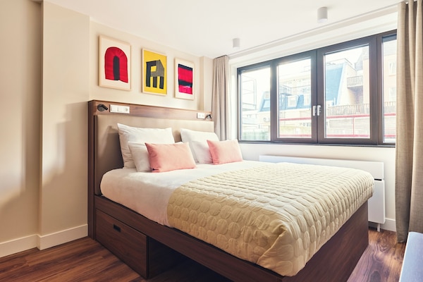 Maisonnette | Luxe beddengoed, een kluis op de kamer, een laptopwerkplek