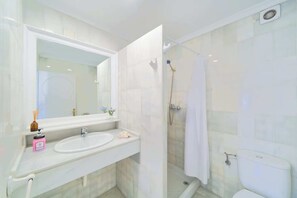 Hair dryer, towels, soap, toilet paper