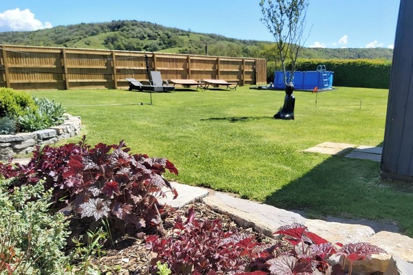 Polden Way and splashpool, viewed from the hot tub..