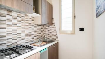 Villa, Patio, Garden View | Private kitchen | Fridge, microwave, stovetop, cookware/dishes/utensils