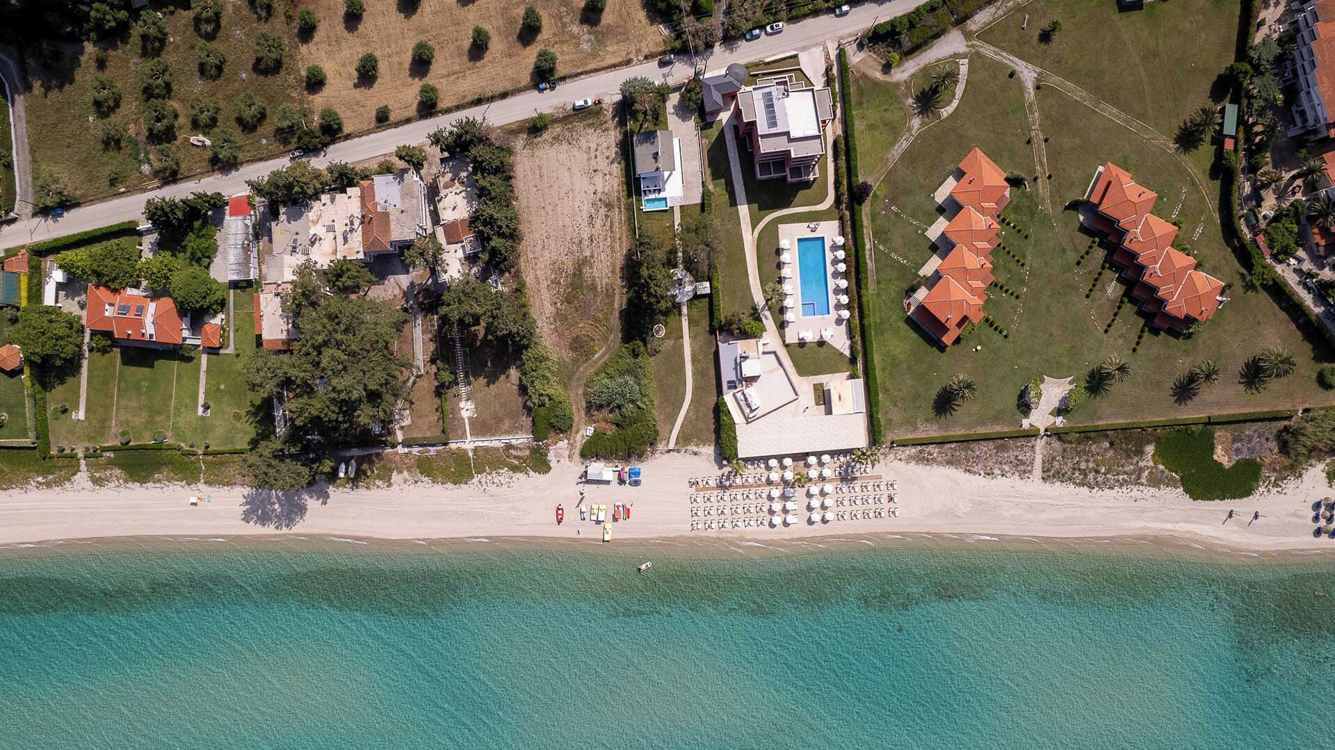 On the beach, sun-loungers, beach towels