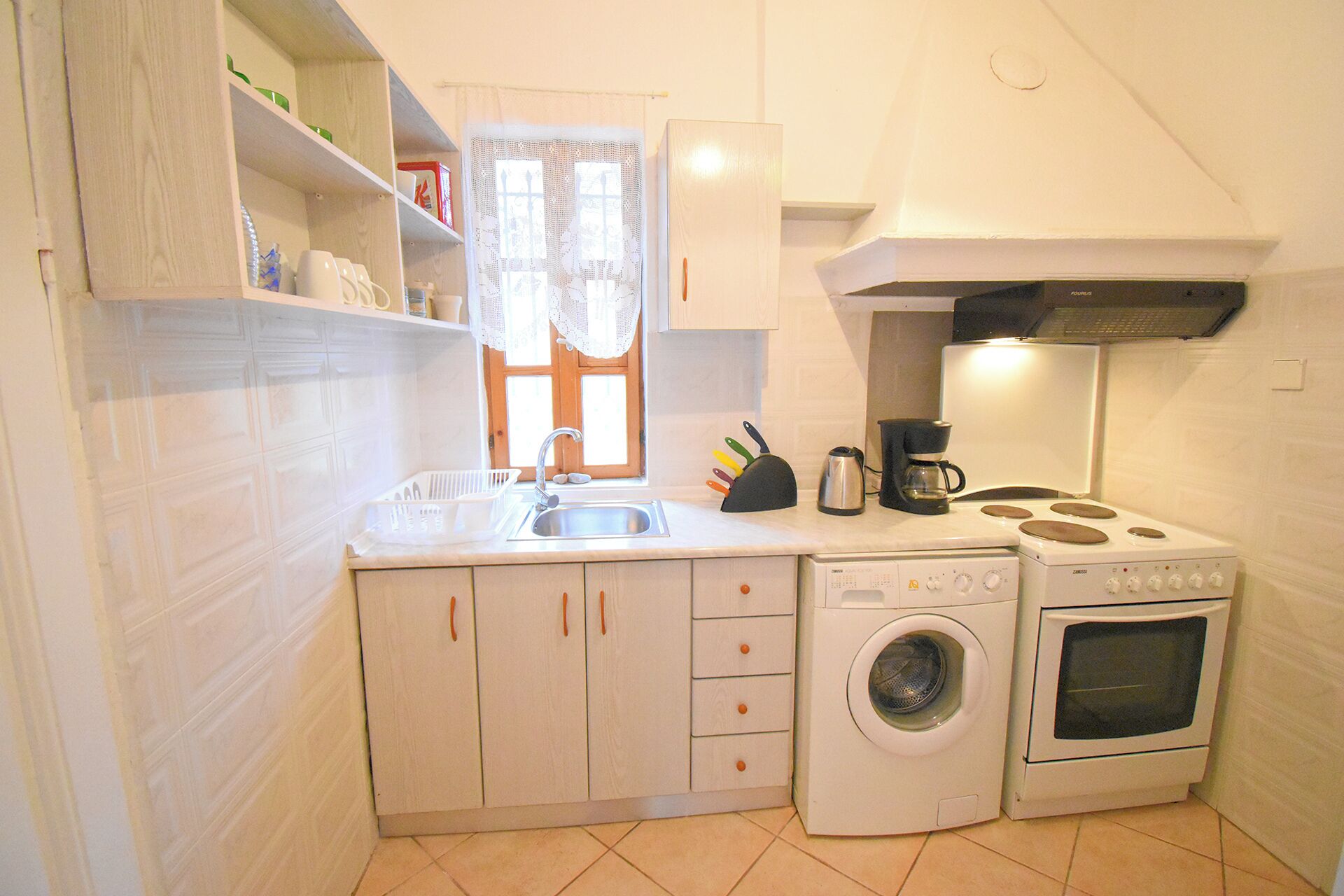 Fridge, oven, coffee/tea maker, toaster