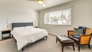 A bedroom with a bed, a chair, a nightstand, a ceiling fan, and a window with blinds. - Community Pool: Scottsdale Condo 2 Mi to ASU (Scottsdale)