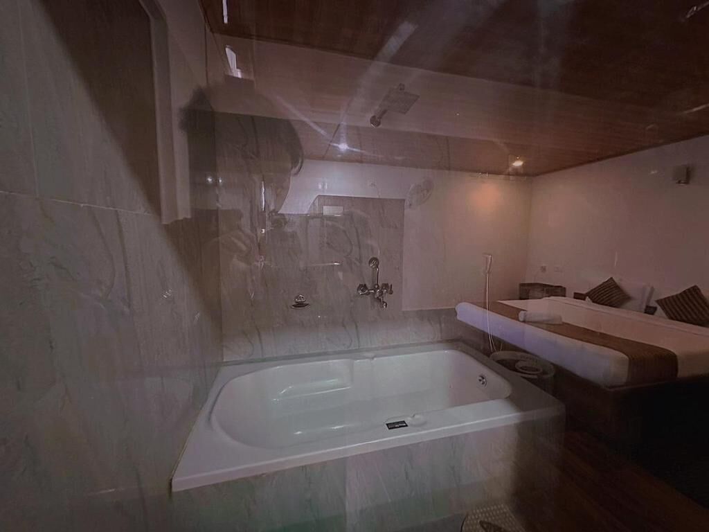 Shower, slippers, towels, soap