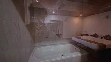 Shower, slippers, towels, soap