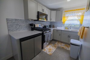Private kitchen - Hilltop Views: City & Sea Escape (Osbourn)