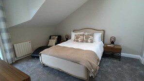 1 غرفة نوم ومكواة/لوح كي وخدمة الإنترنت وملاءات أسرّة