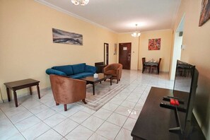 Leilighet – deluxe, kjøkken, byutsikt | Oppholdsområde