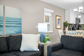 Smart TV, fireplace, books, offices