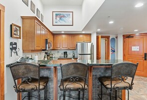 Condo, 2 Bedrooms | Private kitchen | Fridge, oven, dishwasher, coffee/tea maker