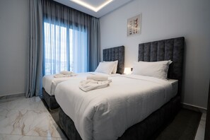 Family Apartment, 3 Bedrooms | In-room safe, desk, blackout drapes, iron/ironing board - AMELIA APPART HOTEL  (Tangier)