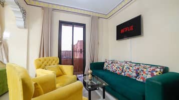 Apartment, Balcony | Living area | Flat-screen TV