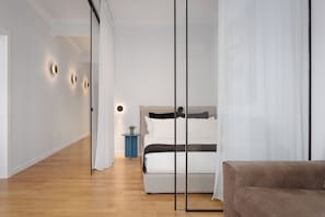 Superior Apartment, Balcony | Living area | 50-inch Smart TV with digital channels