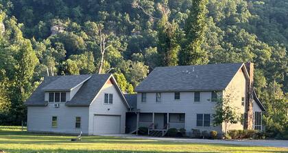 Spacious family home on the banks of the Little Red River in Heber Springs AR.