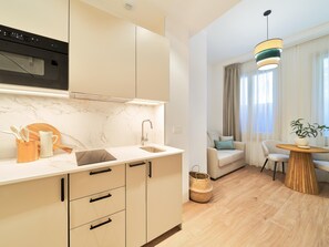 Fridge, microwave, coffee/tea maker, toaster