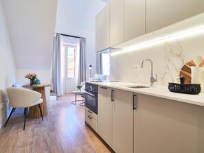 Fridge, microwave, coffee/tea maker, toaster