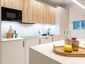 Fridge, microwave, coffee/tea maker, toaster