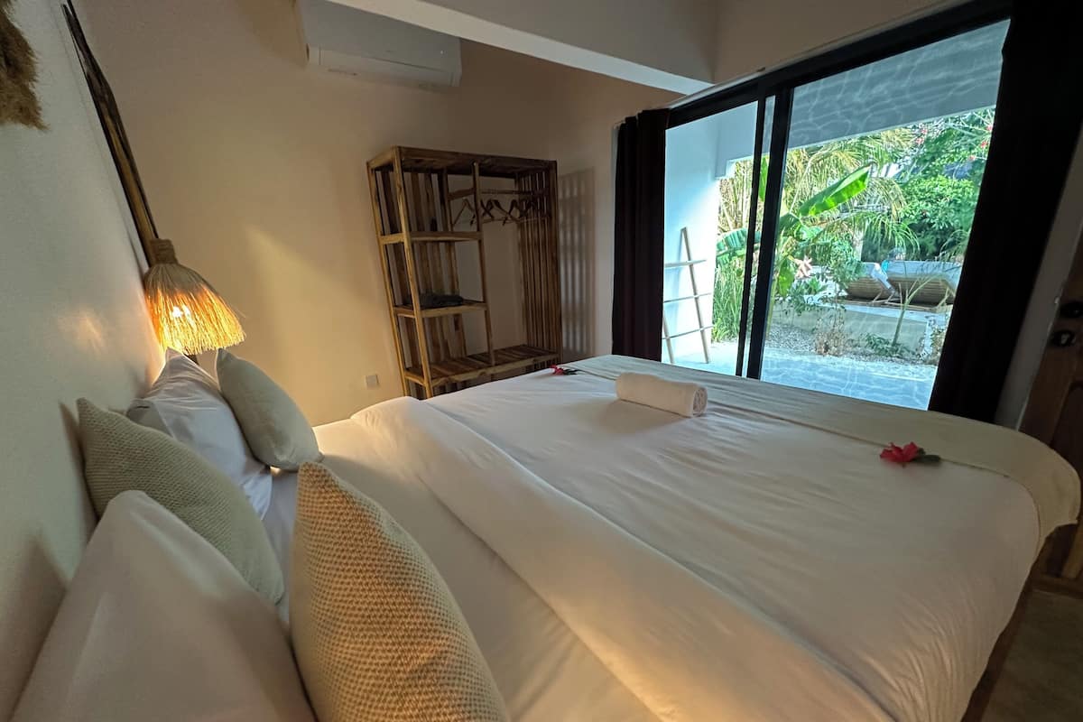 Family Suite, Pool View | Minibar, desk, laptop workspace, cribs (free)