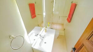 Shower, towels, soap, toilet paper