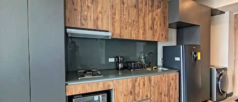 Fridge, microwave, dishwasher, coffee/tea maker