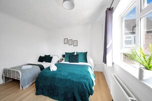 2 chambres, fer et planche à repasser, Wi-Fi, draps fournis