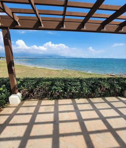 Relax by the pool with the sounds of waves and enjoy   ocean and mountains views