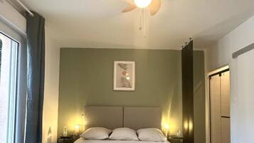 1 slaapkamer, een strijkplank/strijkijzer, wifi, beddengoed