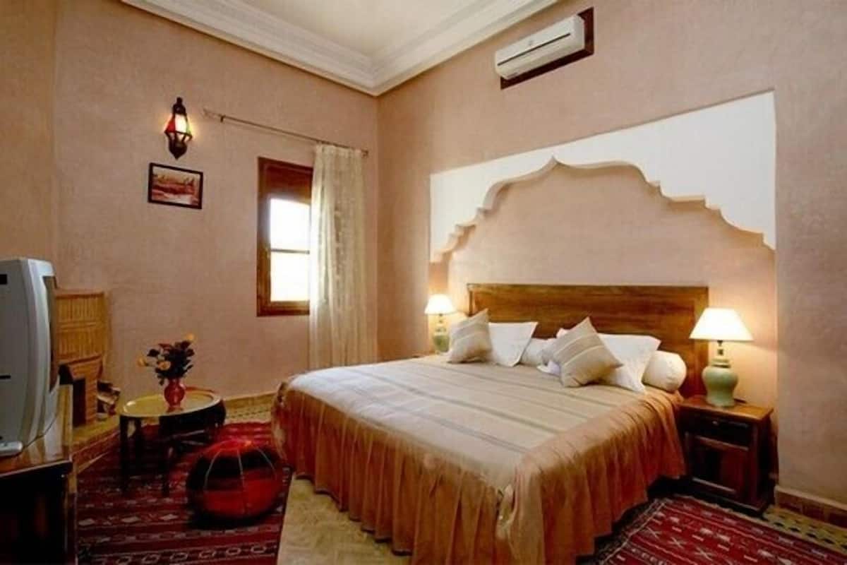 Doppia Deluxe, vista giardino | Una cassaforte in camera, postazione laptop, tende oscuranti