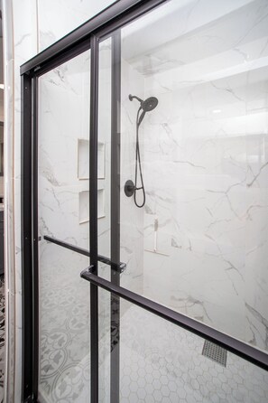 Shower, hair dryer, towels, soap