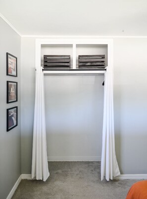 Cozy storage space with bench and ample storage.