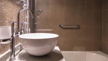 Studio, Balcony, City View | Bathroom | Combined shower/tub, rainfall showerhead, eco-friendly toiletries