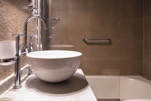 Studio, Balcony, City View | Bathroom | Combined shower/tub, rainfall showerhead, eco-friendly toiletries