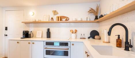 Microwave, stovetop, dishwasher, coffee/tea maker